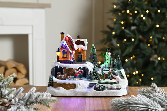 Village Scene with Snowman & Santa