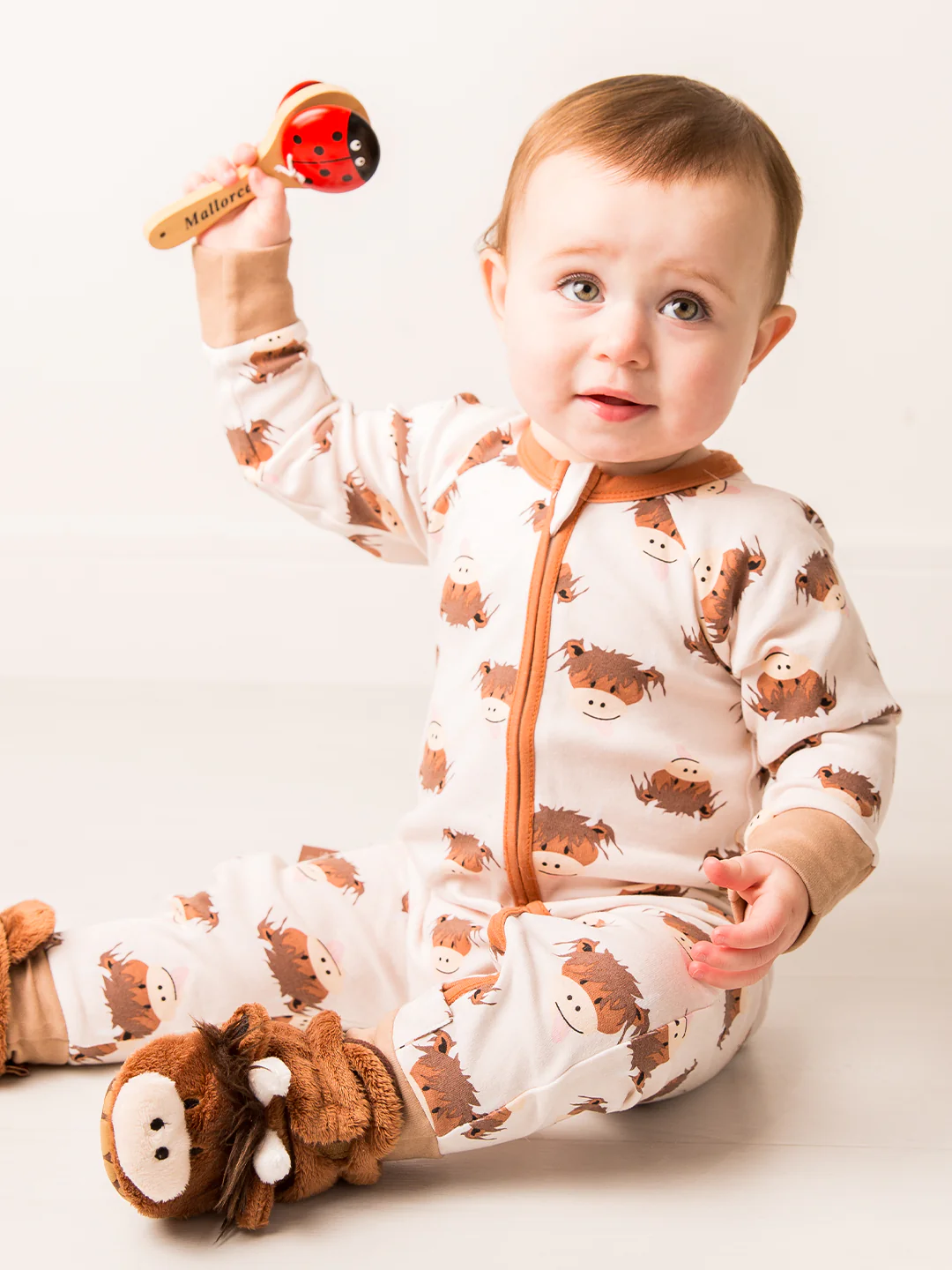Neutral Highland Cow Zip-Up Romper