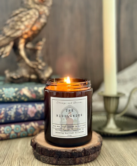 The Highlander Digital Story Candle