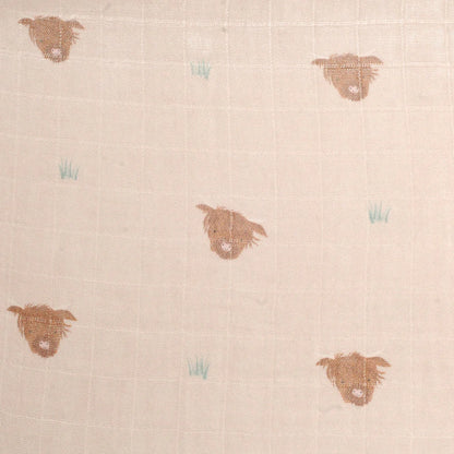 Textile pattern with embroidered dog faces