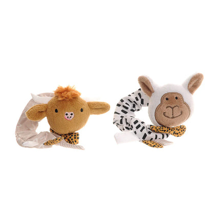 Two plush toys shaped like giraffes and zebras
