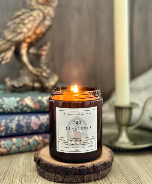 The Highlander Digital Story Candle