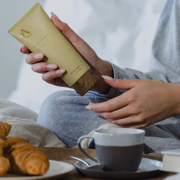 Person holding a beige product packaging