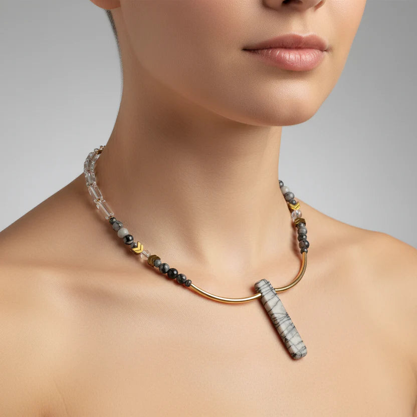 Necklace with large beads worn by a model